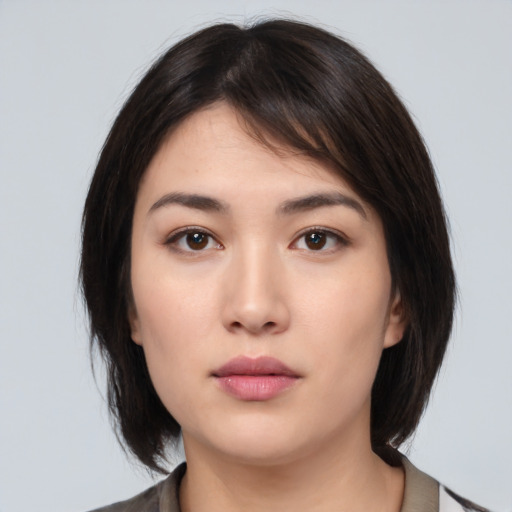 Neutral white young-adult female with medium  brown hair and brown eyes