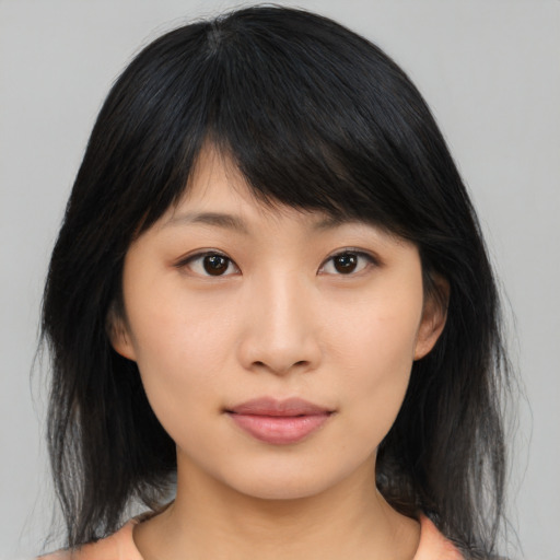 Neutral asian young-adult female with medium  black hair and brown eyes