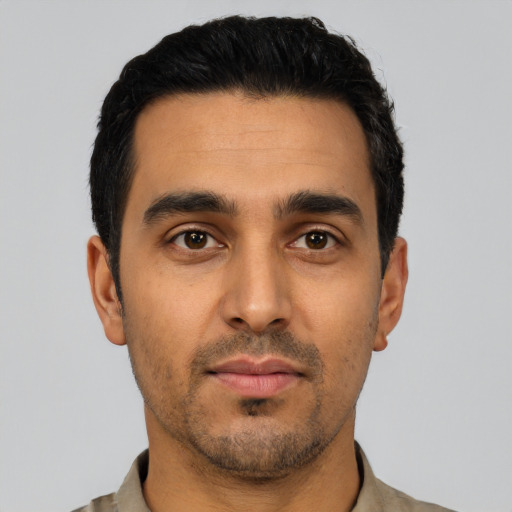 Neutral latino young-adult male with short  black hair and brown eyes
