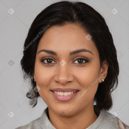 Joyful latino young-adult female with medium  brown hair and brown eyes