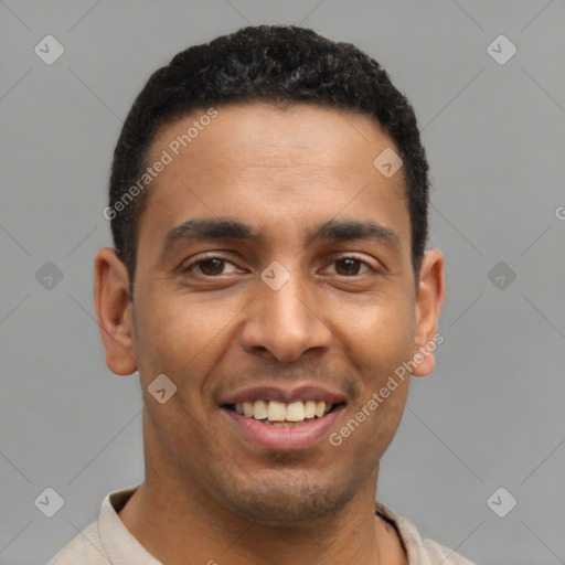 Joyful latino young-adult male with short  brown hair and brown eyes