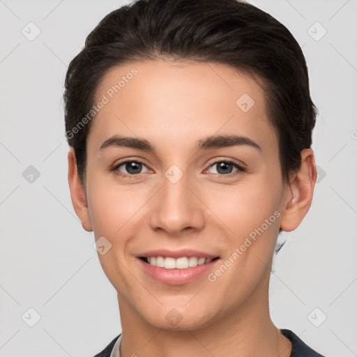 Joyful white young-adult female with short  brown hair and brown eyes