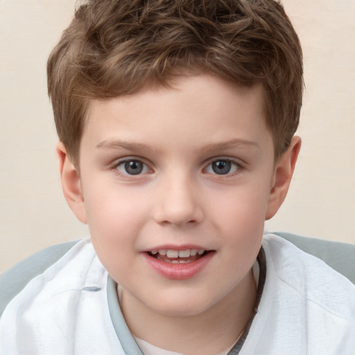 Joyful white child male with short  brown hair and brown eyes