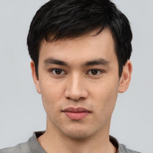 Neutral white young-adult male with short  black hair and brown eyes