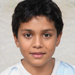 Joyful white child male with short  brown hair and brown eyes