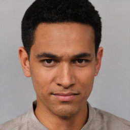 Neutral white young-adult male with short  black hair and brown eyes
