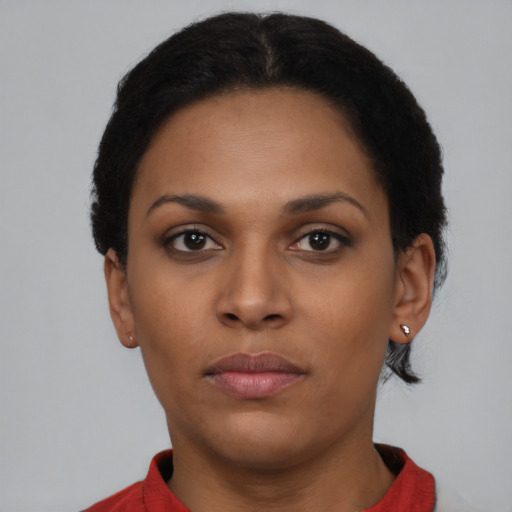Neutral latino young-adult female with short  brown hair and brown eyes
