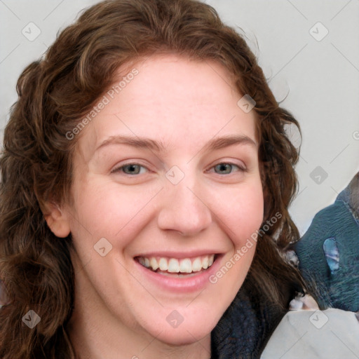 Joyful white young-adult female with medium  brown hair and blue eyes