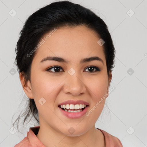 Joyful latino young-adult female with medium  brown hair and brown eyes