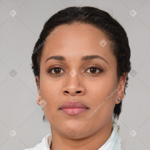 Joyful latino young-adult female with short  brown hair and brown eyes