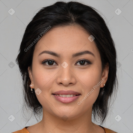 Joyful asian young-adult female with medium  brown hair and brown eyes