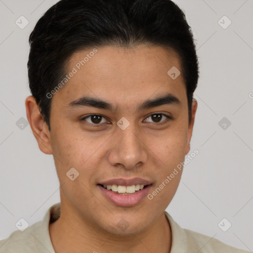 Joyful latino young-adult male with short  brown hair and brown eyes