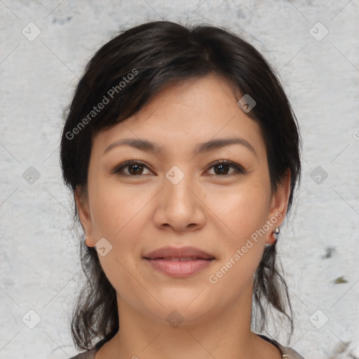 Joyful asian young-adult female with medium  brown hair and brown eyes