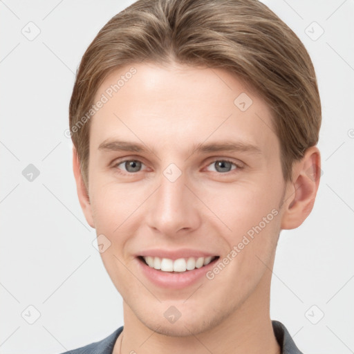 Joyful white young-adult female with short  brown hair and grey eyes