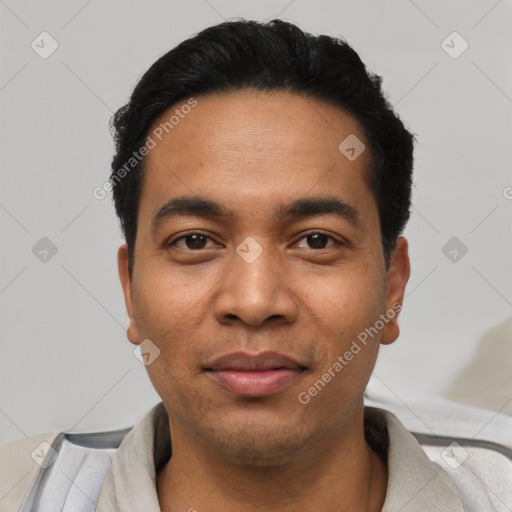 Joyful asian young-adult male with short  black hair and brown eyes