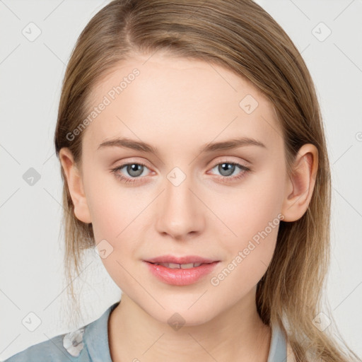 Joyful white young-adult female with medium  brown hair and blue eyes