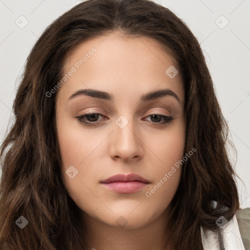 Neutral white young-adult female with long  brown hair and brown eyes