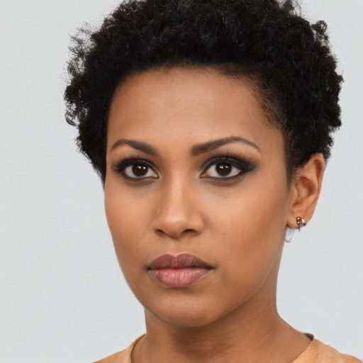 Neutral black young-adult female with short  brown hair and brown eyes