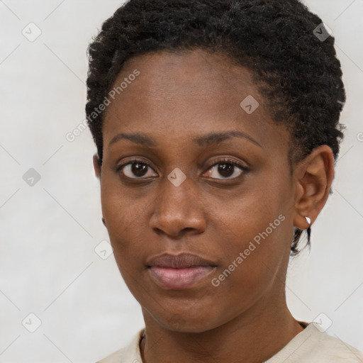 Neutral black young-adult female with short  brown hair and brown eyes