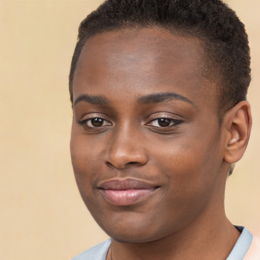 Joyful black young-adult female with short  brown hair and brown eyes