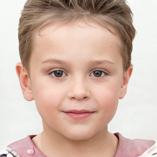 Joyful white child female with short  brown hair and grey eyes