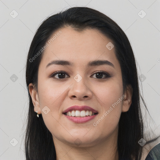 Joyful asian young-adult female with long  black hair and brown eyes