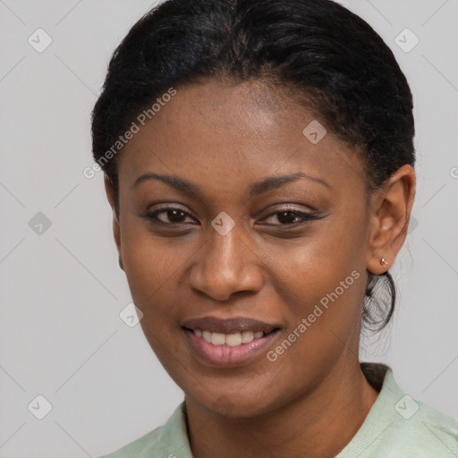 Joyful black young-adult female with short  brown hair and brown eyes