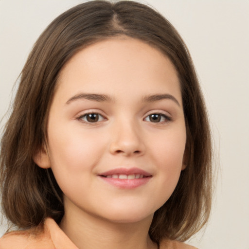 Joyful white child female with medium  brown hair and brown eyes