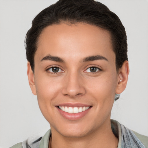 Joyful white young-adult female with short  brown hair and brown eyes