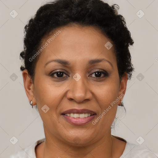 Joyful latino adult female with short  brown hair and brown eyes