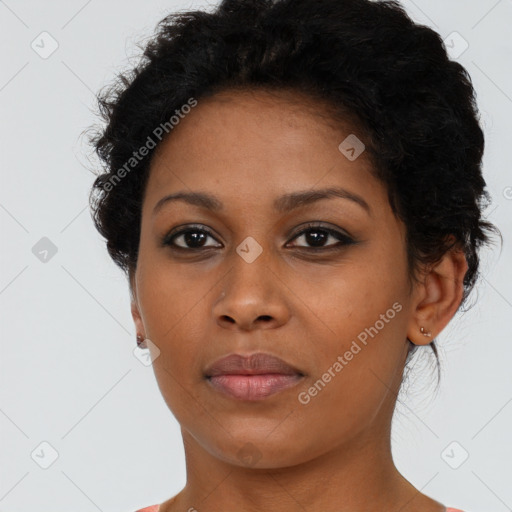 Neutral black young-adult female with short  brown hair and brown eyes