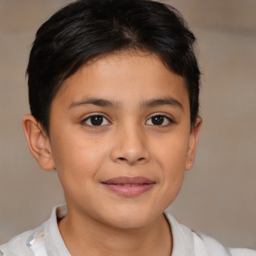 Joyful white child female with short  brown hair and brown eyes