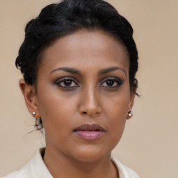 Neutral black young-adult female with short  brown hair and brown eyes