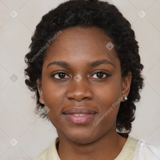 Joyful black young-adult female with medium  black hair and brown eyes