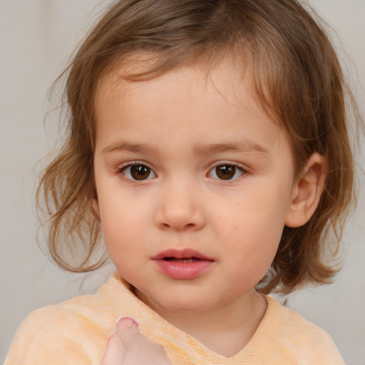 Neutral white child female with medium  brown hair and brown eyes