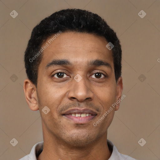 Joyful latino young-adult male with short  brown hair and brown eyes