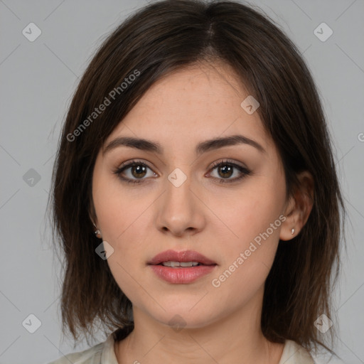 Neutral white young-adult female with medium  brown hair and brown eyes