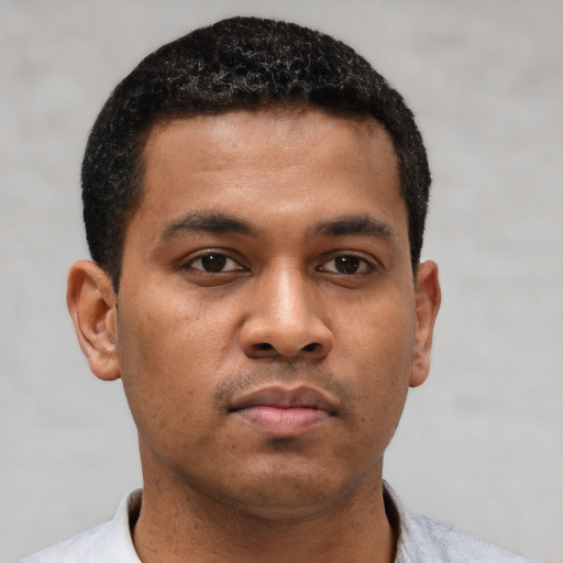 Neutral black young-adult male with short  brown hair and brown eyes