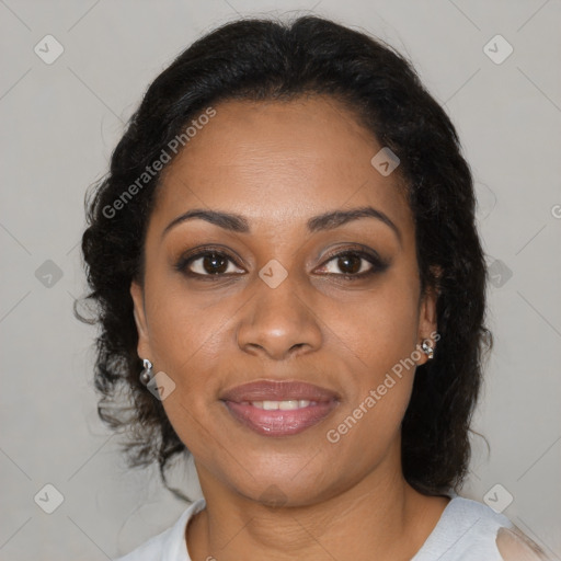 Joyful black young-adult female with medium  brown hair and brown eyes