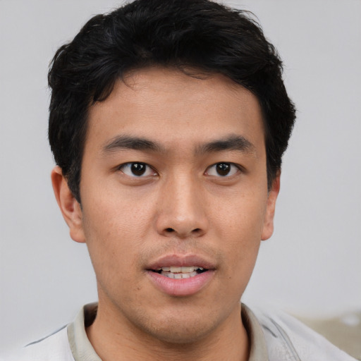 Neutral asian young-adult male with short  brown hair and brown eyes