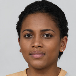 Neutral black young-adult female with short  brown hair and brown eyes