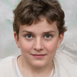 Joyful white child female with short  brown hair and grey eyes