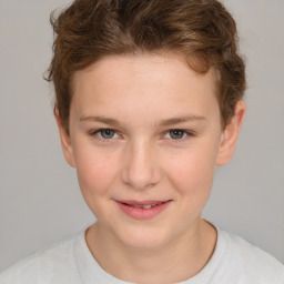 Joyful white child female with short  brown hair and brown eyes