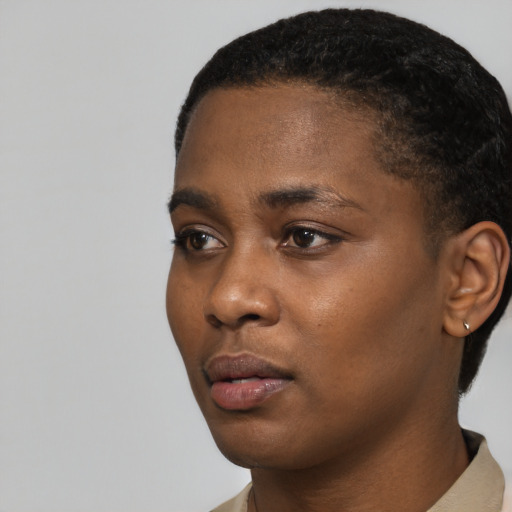 Neutral black young-adult female with short  black hair and brown eyes