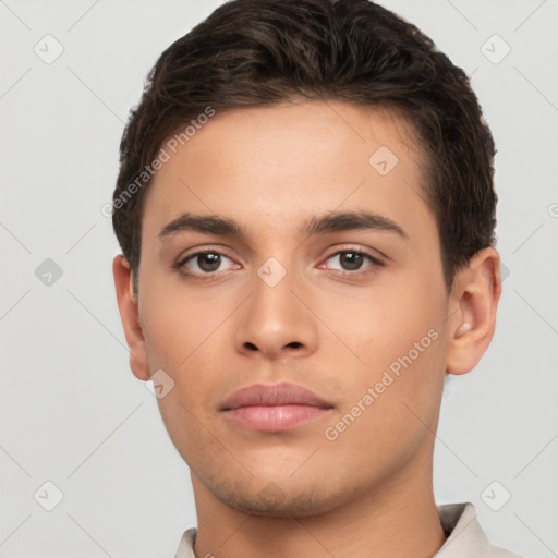 Neutral white young-adult male with short  brown hair and brown eyes