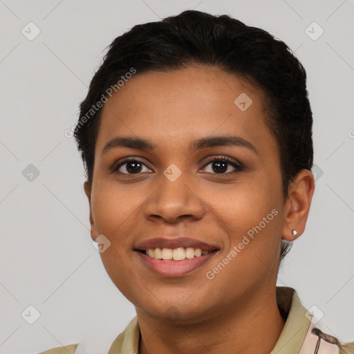 Joyful latino young-adult female with short  brown hair and brown eyes