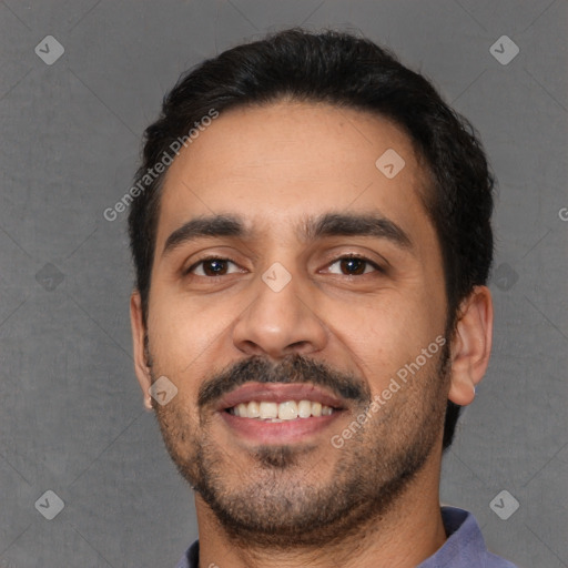 Joyful white young-adult male with short  black hair and brown eyes