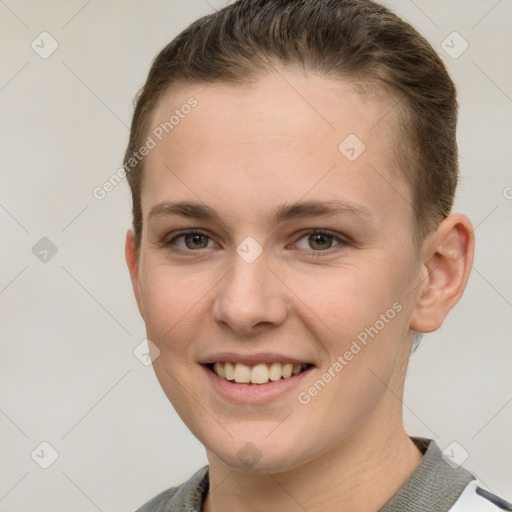 Joyful white young-adult female with short  brown hair and grey eyes