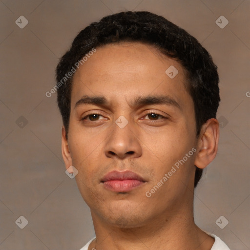 Neutral latino young-adult male with short  black hair and brown eyes