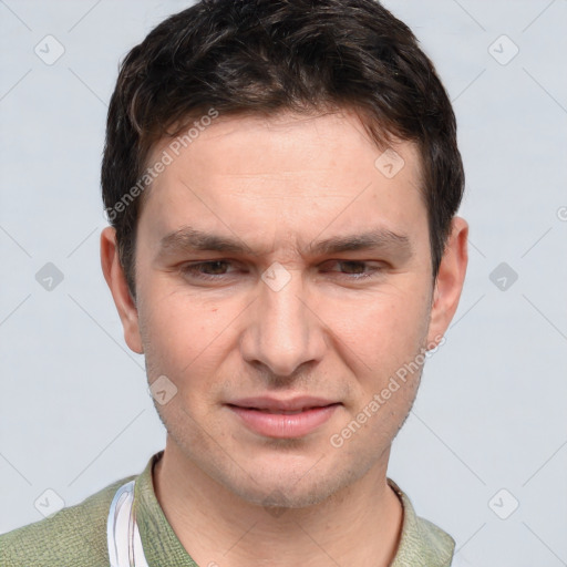 Joyful white adult male with short  brown hair and brown eyes